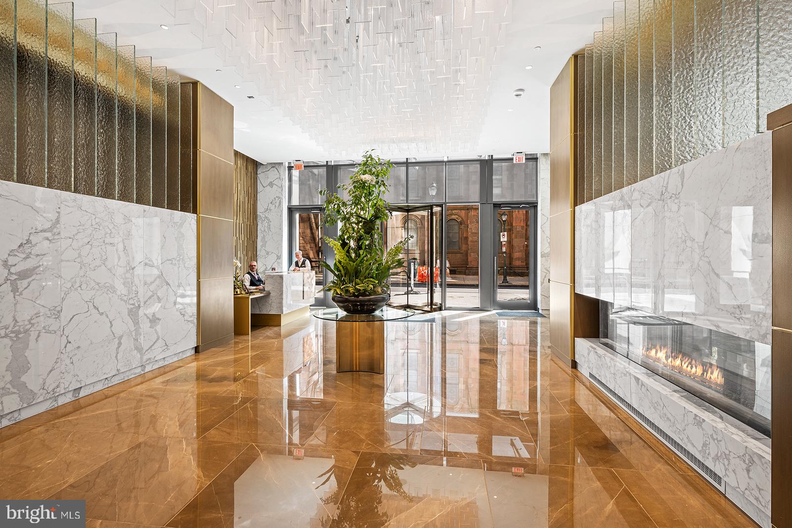 1911 Walnut Street, Unit PH4701 Philadelphia, PA 19103 - Photo 11 of 29 a swimming pool with outdoor seating and yard