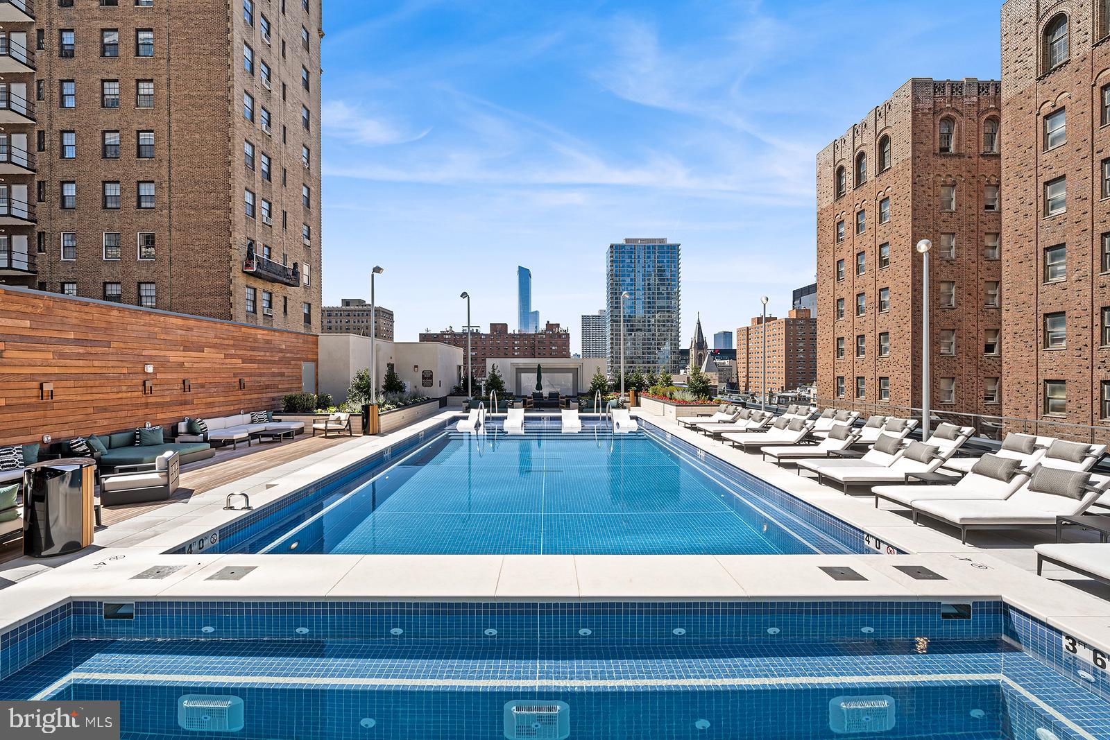 1911 Walnut Street, Unit PH4701 Philadelphia, PA 19103 - Photo 26 of 29 a view of swimming pool with outdoor seating