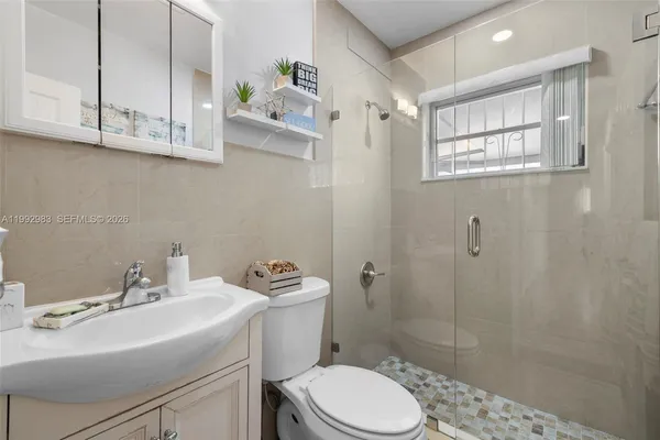 a kitchen with sink and stove