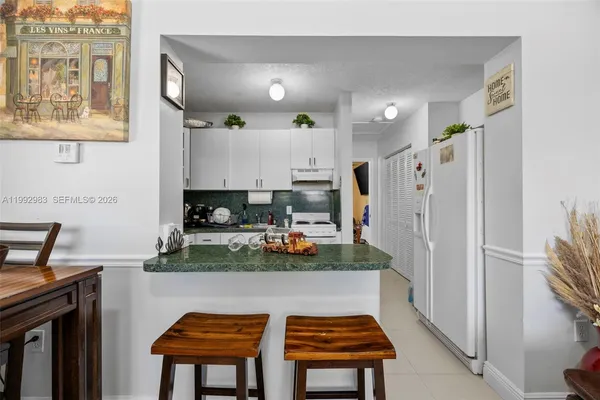 a view of a dining room with furniture