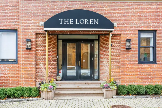 a sign on the side of a building