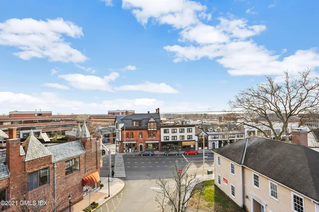 a view of a terrace with furniture and stove