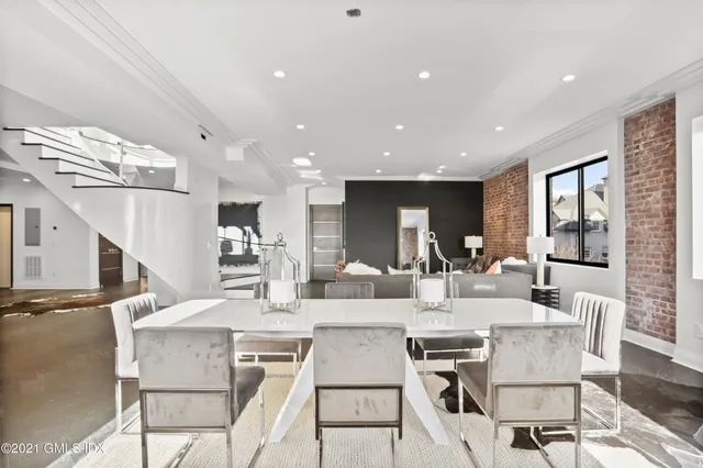 a view of a dining room with furniture