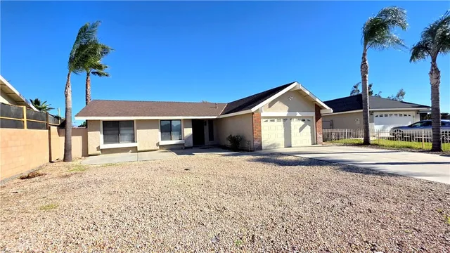 a house view with a garden space