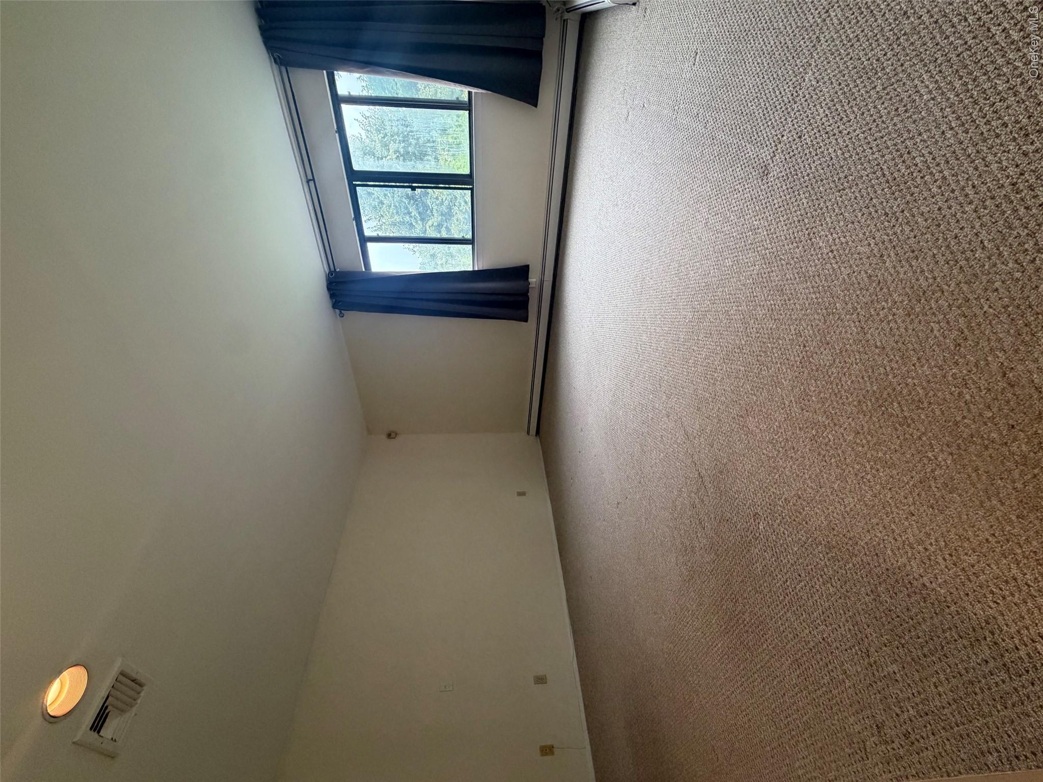 75 Greenway Close, Unit 75 Rye Brook, NY 10573 - Photo 17 of 23 Primary bedroom