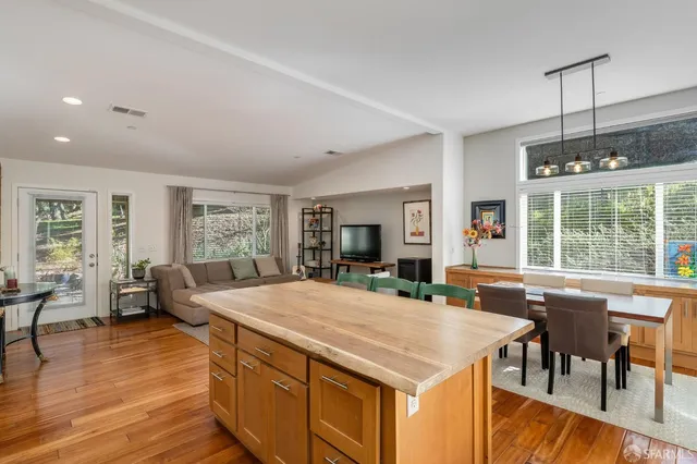 a view of a dining room with furniture window and outside view