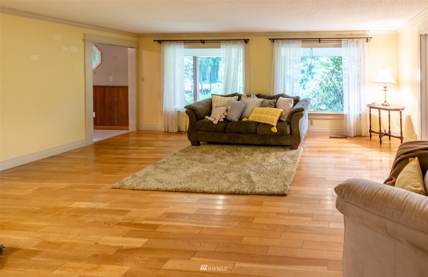 8691 Weidkamp Road Lynden, WA 98264 - Photo 12 of 39 a living room with furniture and a large window