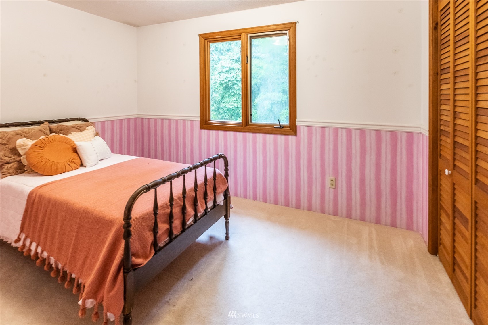 8691 Weidkamp Road Lynden, WA 98264 - Photo 16 of 39 a bedroom with a bed and a window
