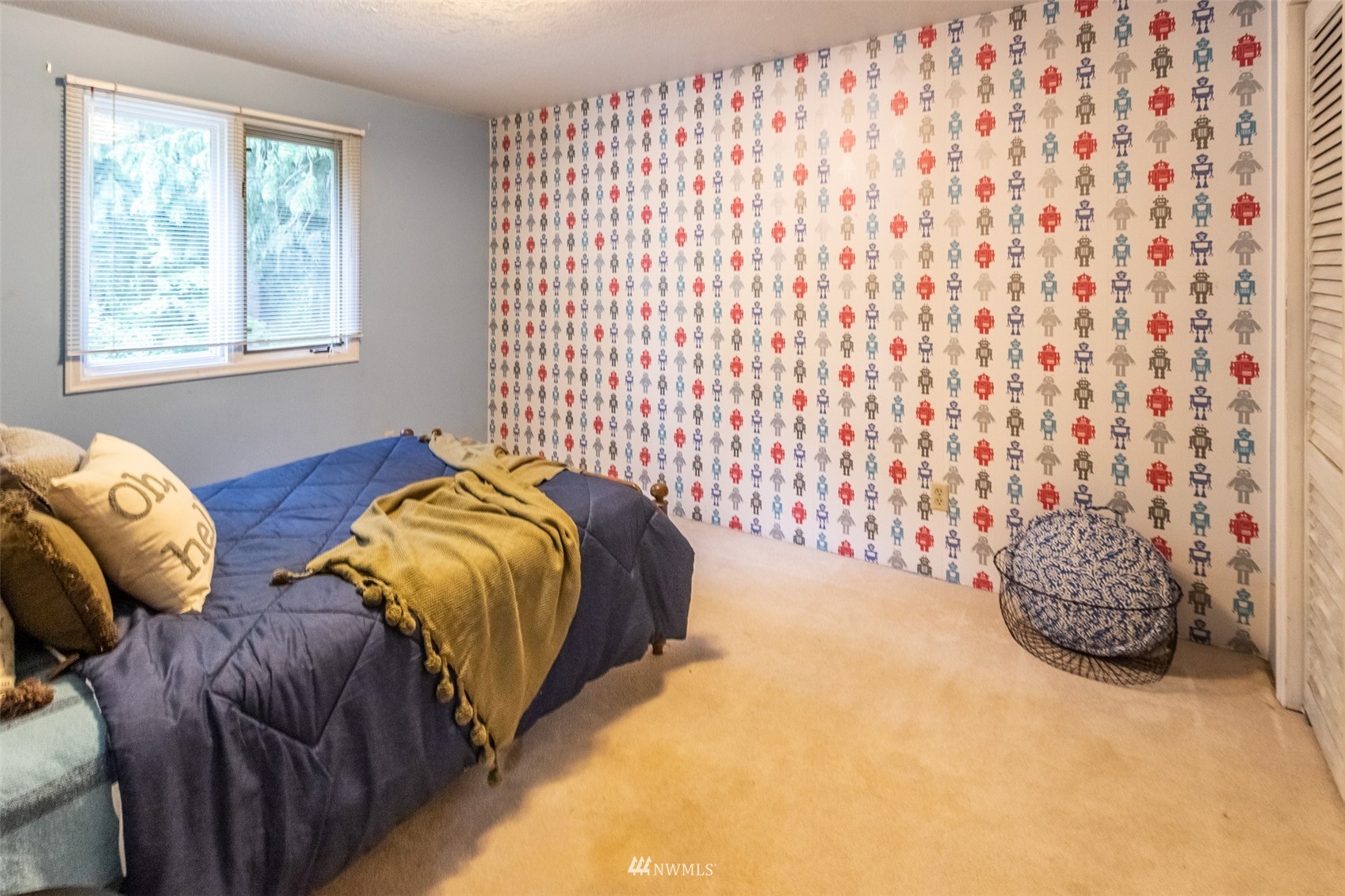8691 Weidkamp Road Lynden, WA 98264 - Photo 17 of 39 a bedroom with a bed and a window