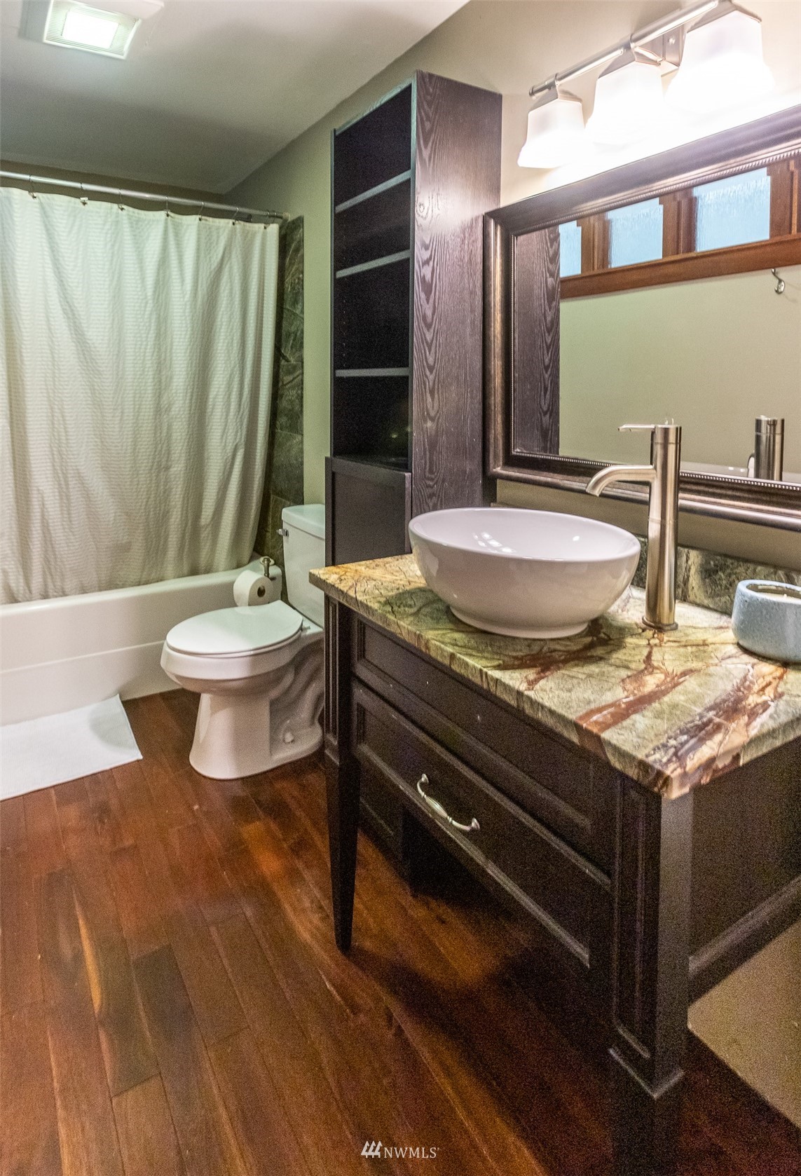 8691 Weidkamp Road Lynden, WA 98264 - Photo 19 of 39 a bathroom with a granite countertop sink toilet and shower
