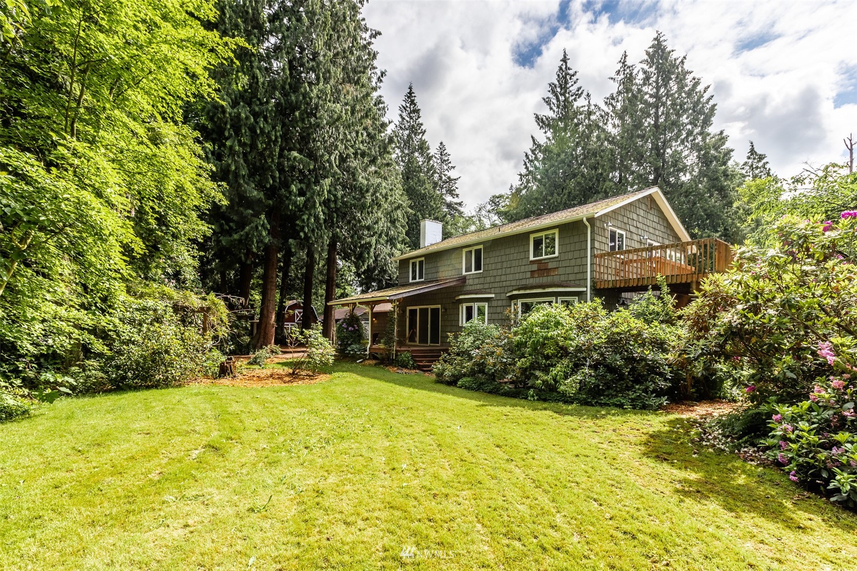 8691 Weidkamp Road Lynden, WA 98264 - Photo 24 of 39 a front view of house with yard and trees around
