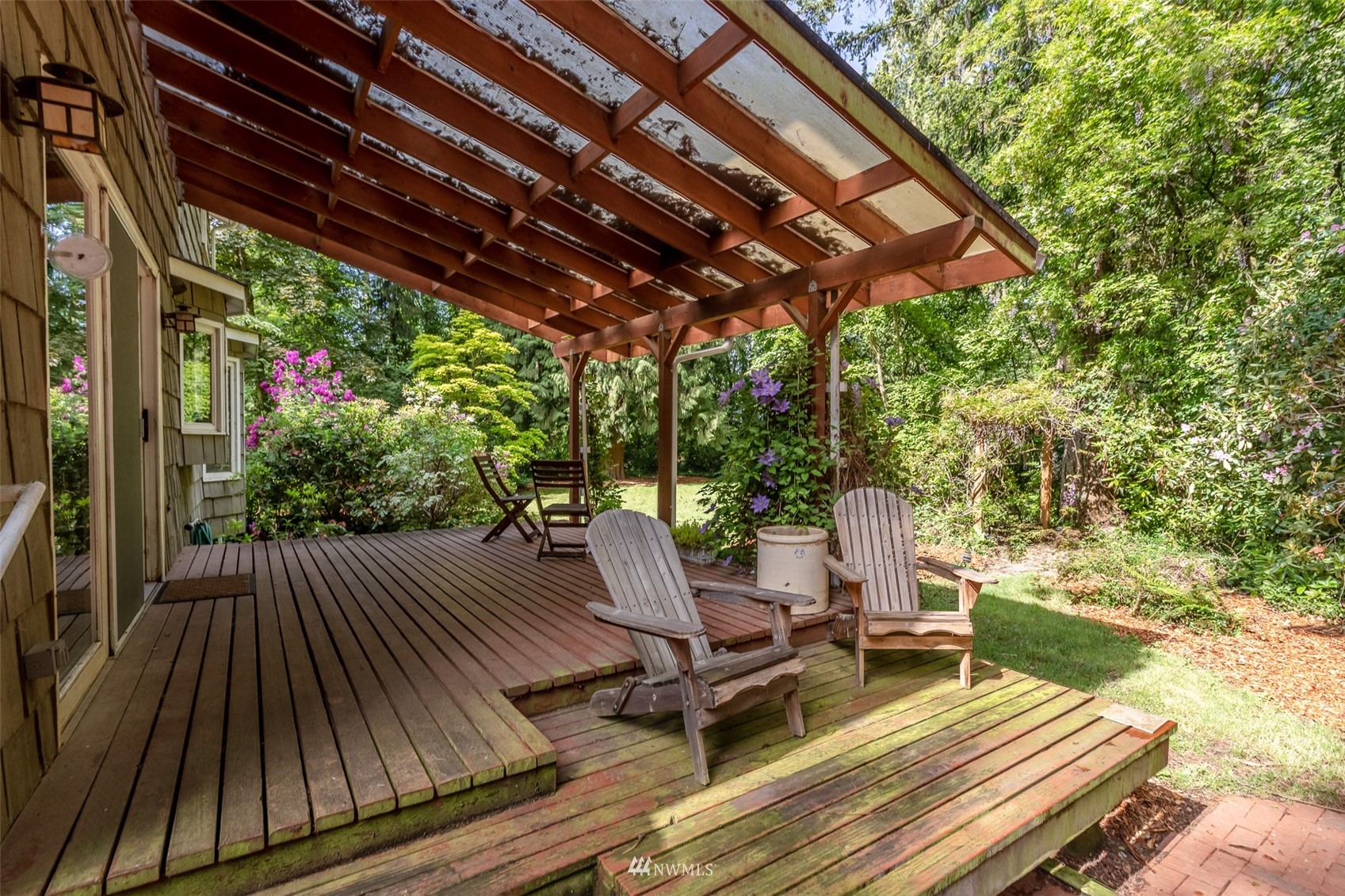 8691 Weidkamp Road Lynden, WA 98264 - Photo 26 of 39 a view of patio with chairs and wooden floor