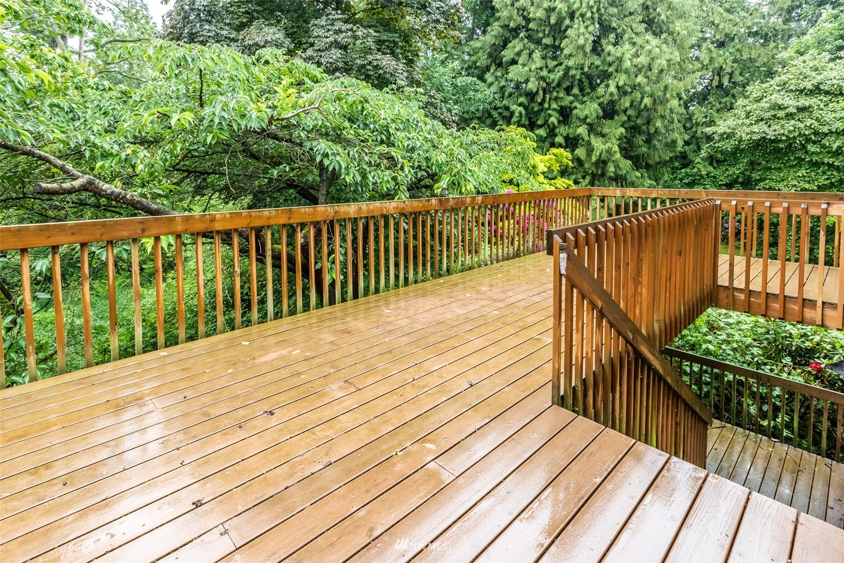 8691 Weidkamp Road Lynden, WA 98264 - Photo 28 of 39 a balcony with trees in front of it