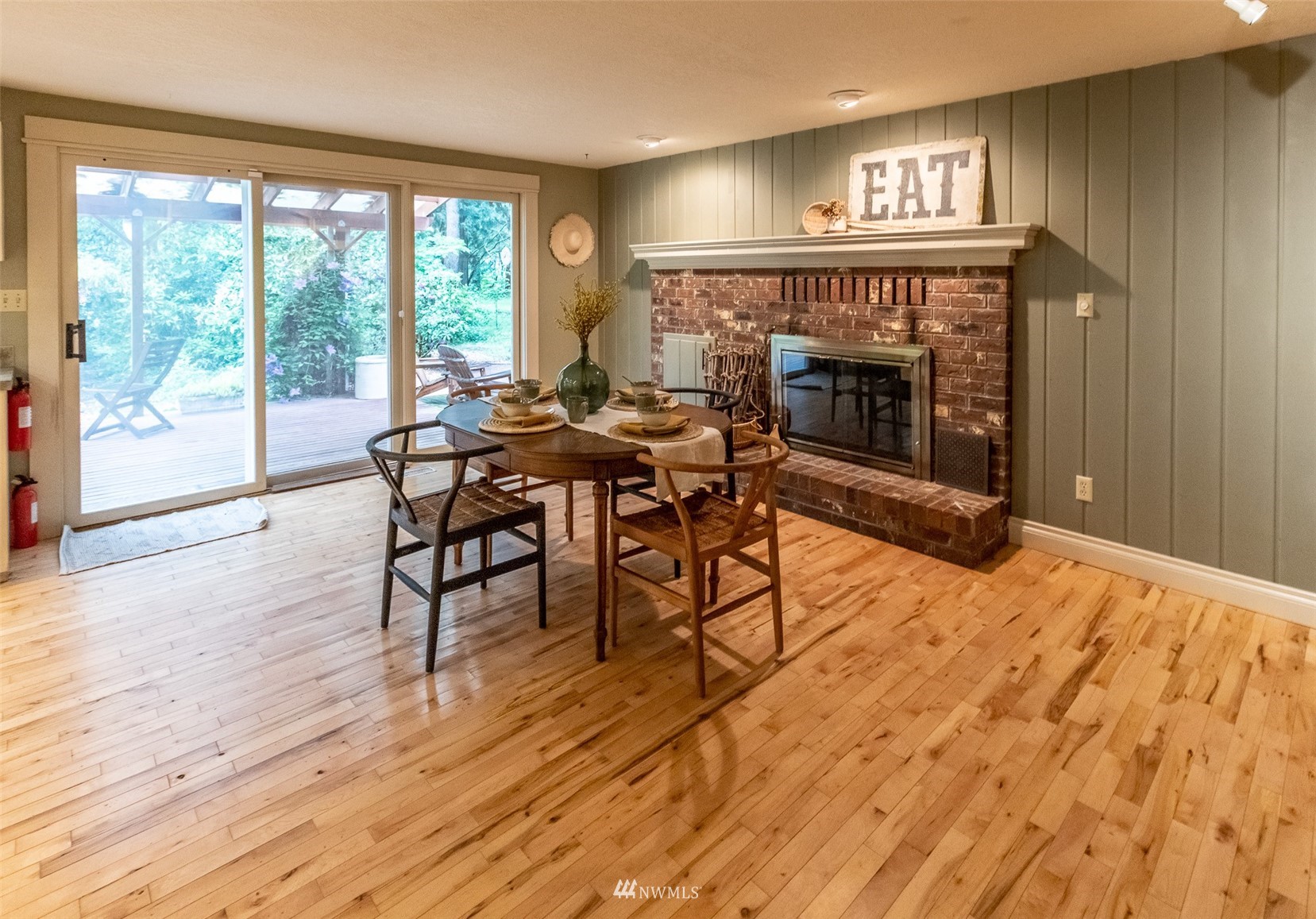 8691 Weidkamp Road Lynden, WA 98264 - Photo 8 of 39 a living room with furniture and a fireplace