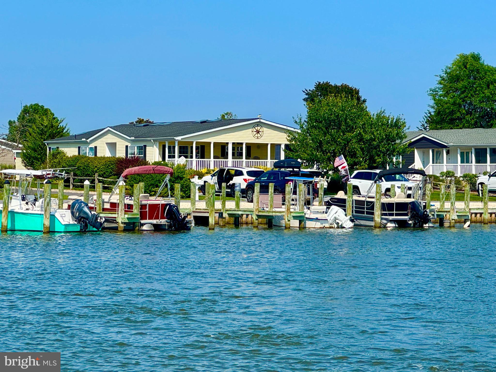 34805 Rowlock Place, Unit 50349 Millsboro, DE 19966 - Photo 2 of 62 Waterfront with Boat Slip, Boat & golf cart!
