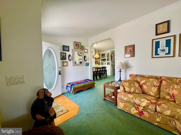 a view of a livingroom with furniture and window