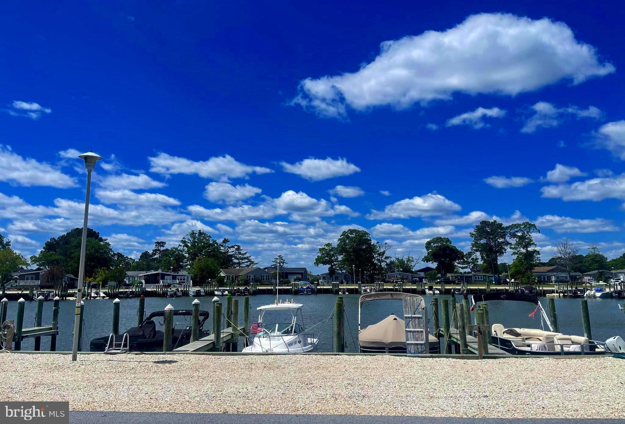 34805 Rowlock Place, Unit 50349 Millsboro, DE 19966 - Photo 3 of 62 Waterfront views with Boat Slip and Boat included!