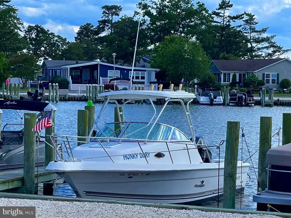 a view of house with outdoor space and sitting area