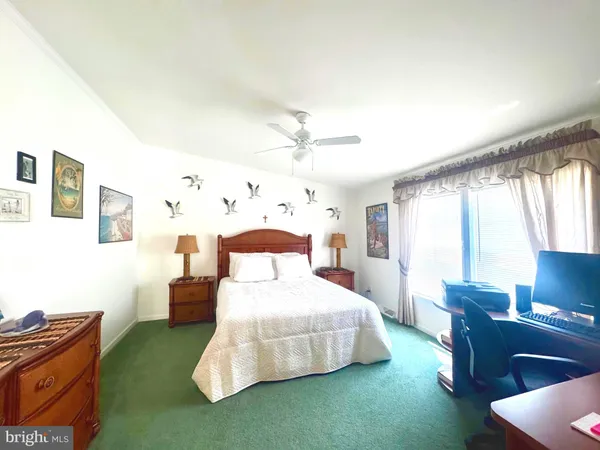 a spacious bathroom with a double vanity sink a mirror and a bathtub