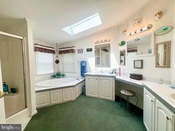 a street sign on a wall next to a white wall