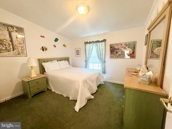 a view of a balcony with chairs