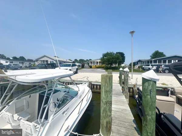a view of swimming pool with outdoor seating