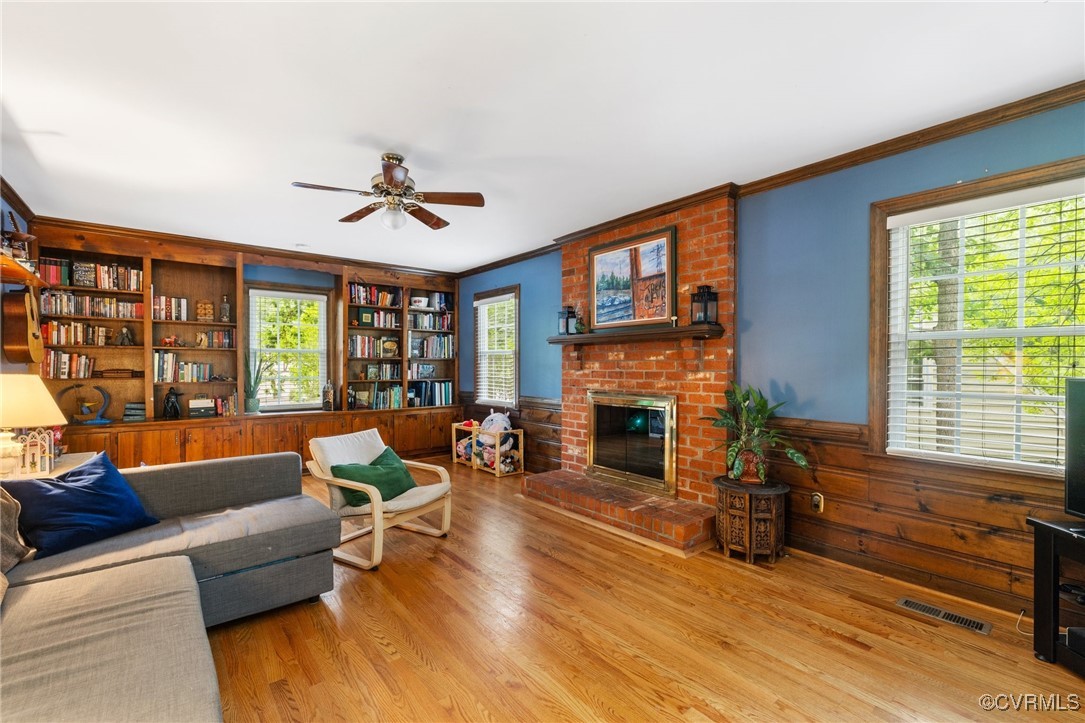 8264 Siege Road Mechanicsville, VA 23111 - Photo 14 of 29 a living room with furniture and a fireplace