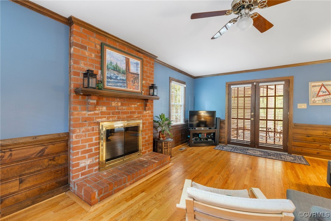 8264 Siege Road Mechanicsville, VA 23111 - Photo 15 of 29 a living room with furniture pool table and a fireplace