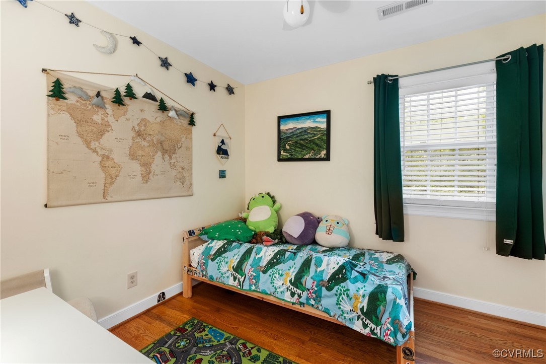 8264 Siege Road Mechanicsville, VA 23111 - Photo 20 of 29 a bedroom with bed and window