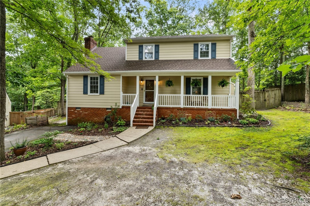 8264 Siege Road Mechanicsville, VA 23111 - Photo 2 of 29 front view of a house with a yard