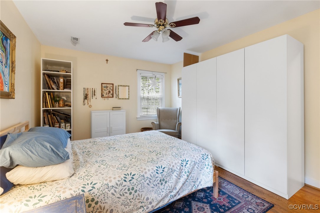 8264 Siege Road Mechanicsville, VA 23111 - Photo 22 of 29 a bedroom with a bed dresser and a window