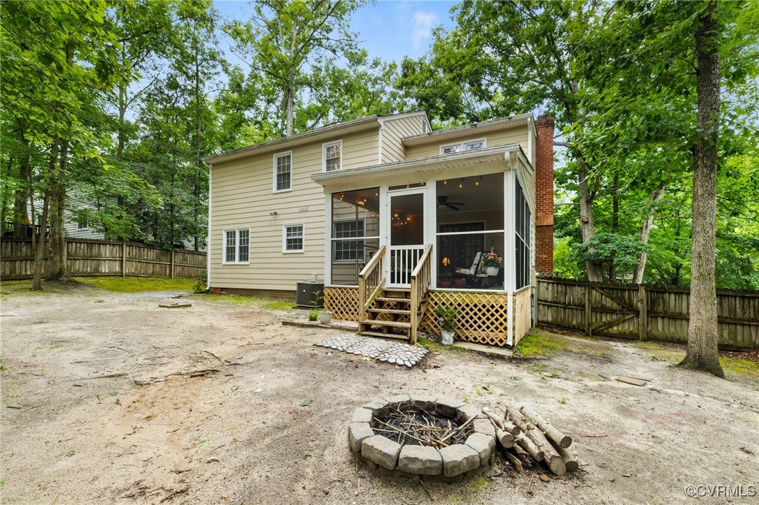 8264 Siege Road Mechanicsville, VA 23111 - Photo 28 of 29 a house with trees in the background