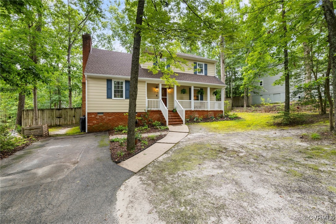 8264 Siege Road Mechanicsville, VA 23111 - Photo 3 of 29 a view of a house with swimming pool