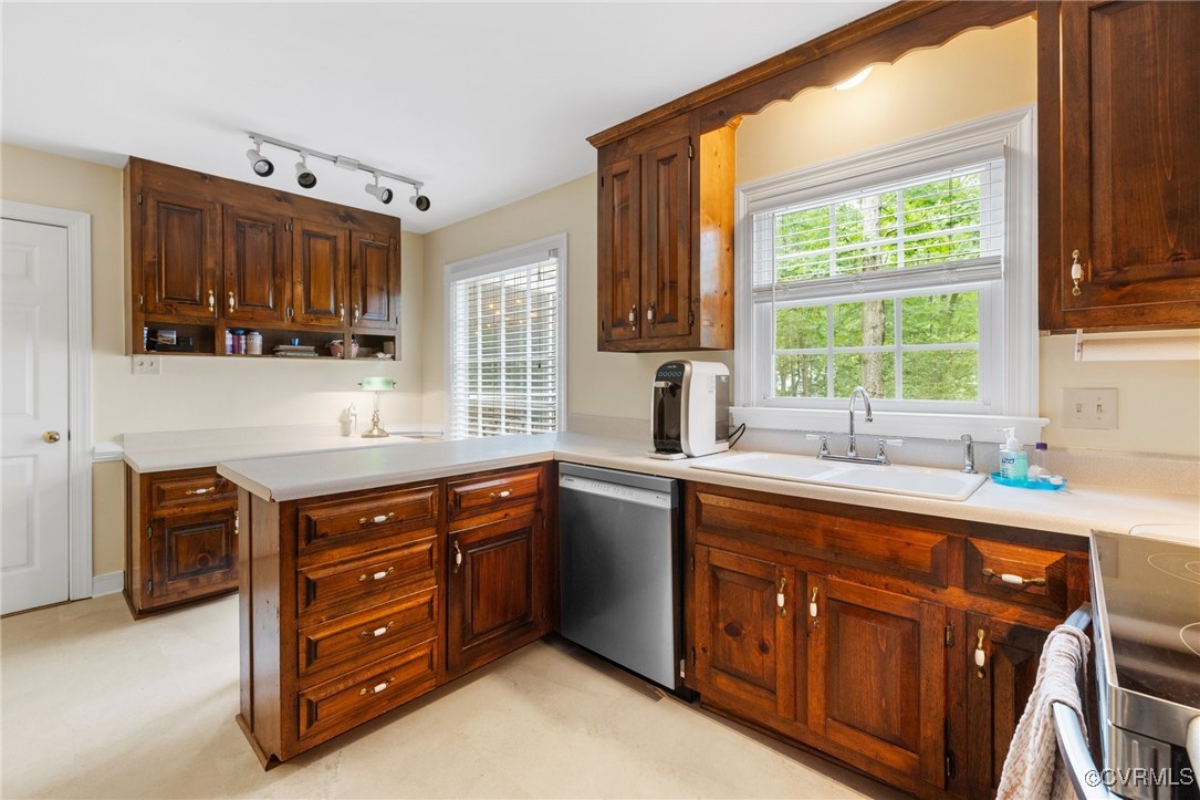 8264 Siege Road Mechanicsville, VA 23111 - Photo 9 of 29 a kitchen with stainless steel appliances sink cabinets and window