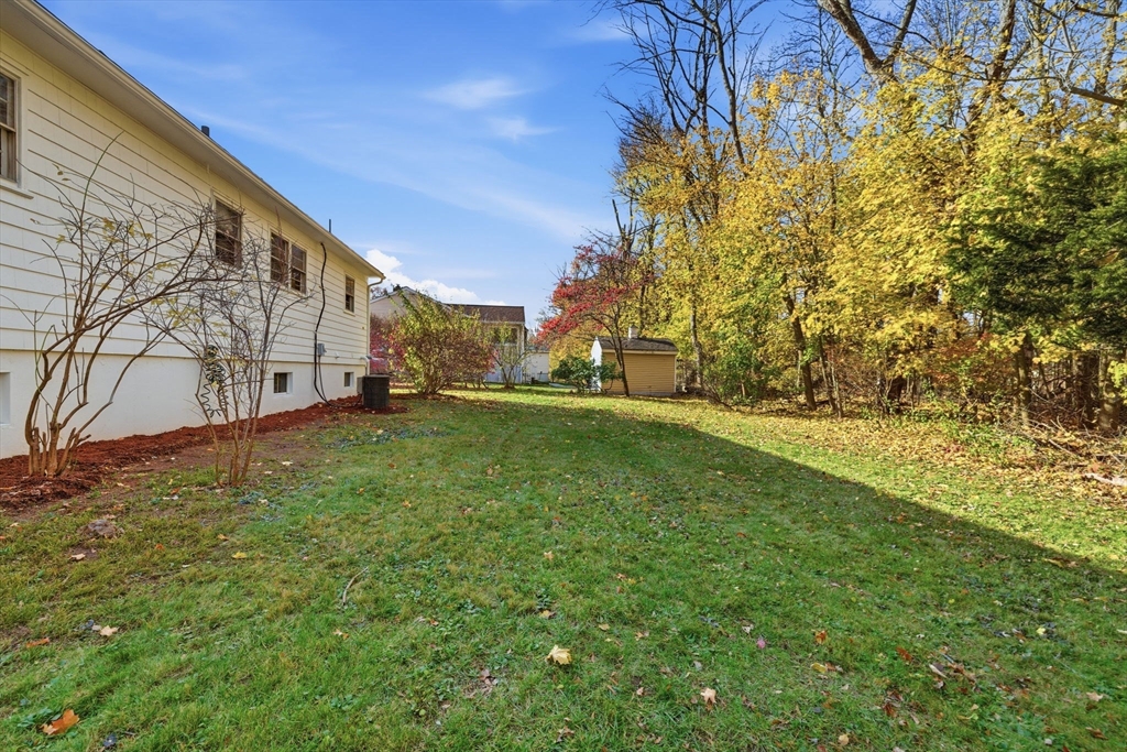 46 Linwood Street Andover, MA 01810 - Photo 22 of 28 a view of yard with green space
