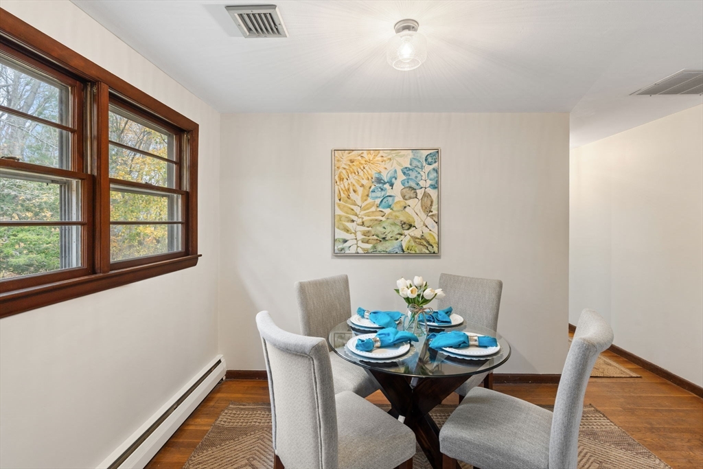 46 Linwood Street Andover, MA 01810 - Photo 8 of 28 a view of a dining room with furniture and window