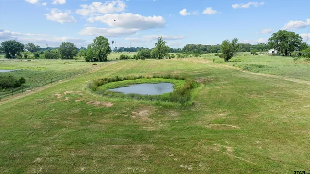 a view of a lake with a city