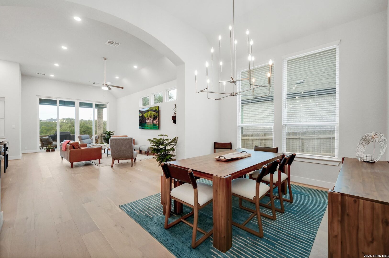 1410 Lytham Bulverde, TX 78163 - Photo 15 of 35 a view of a dining room with furniture and wooden floor