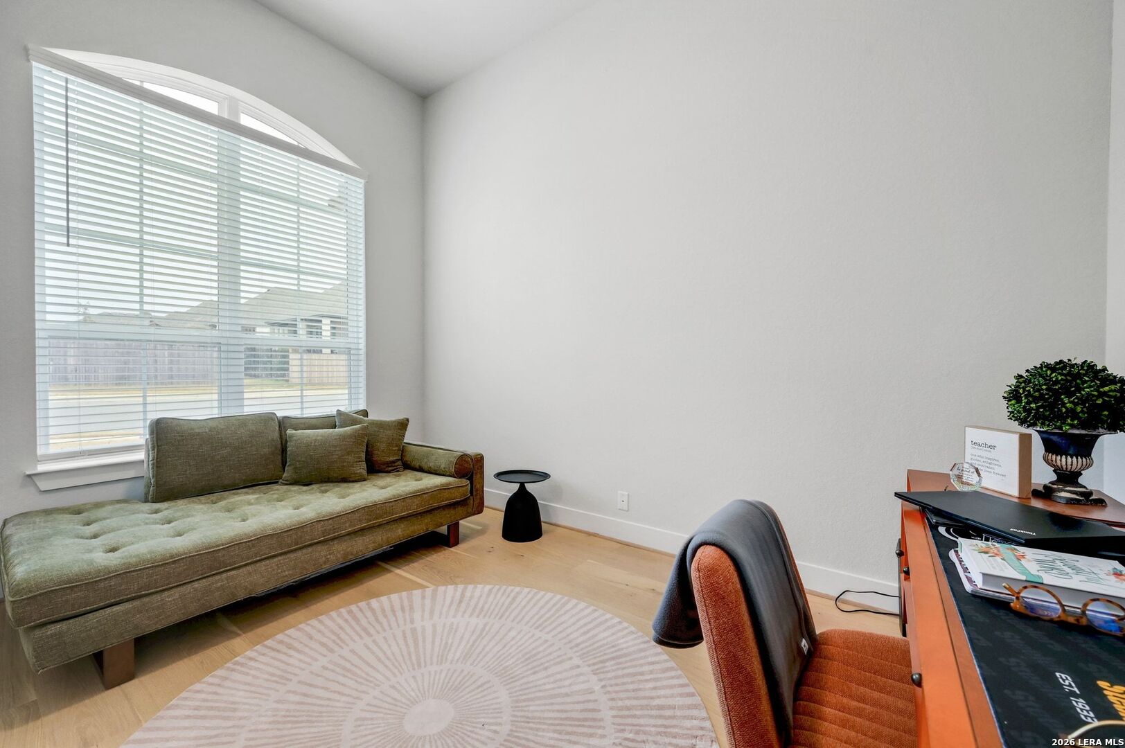 1410 Lytham Bulverde, TX 78163 - Photo 17 of 35 a living room with furniture and a window