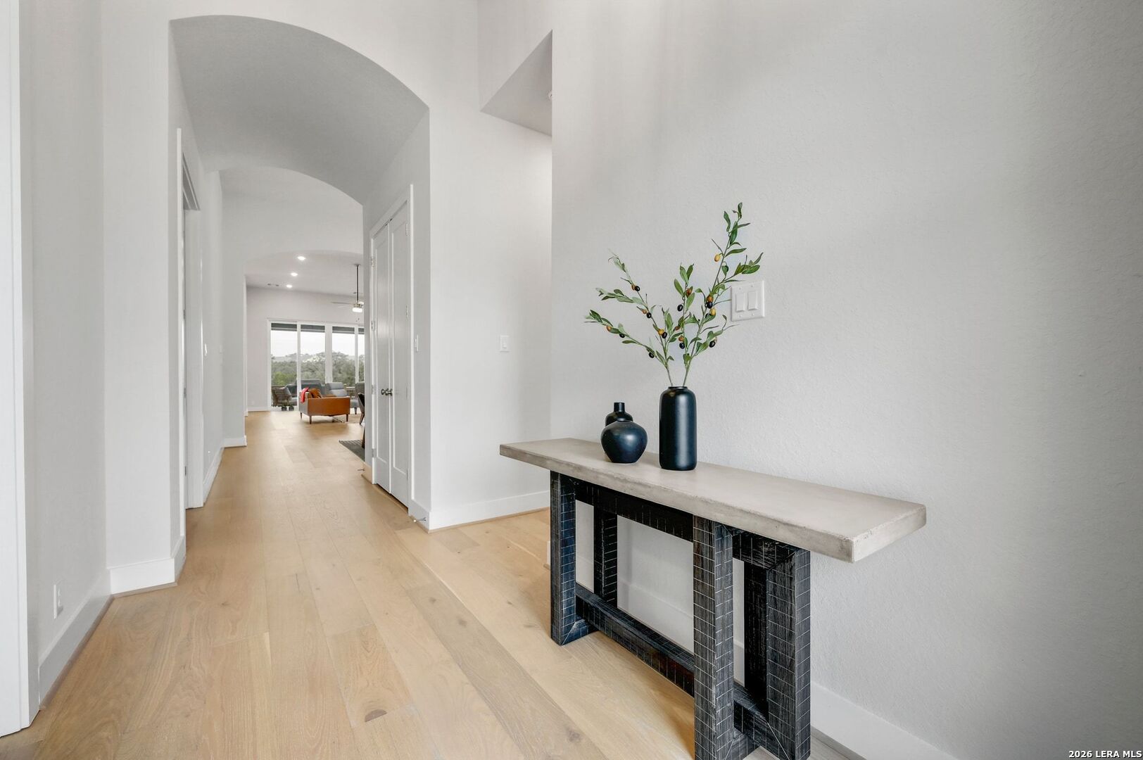 1410 Lytham Bulverde, TX 78163 - Photo 5 of 35 a view of a hallway view with wooden floor and furniture