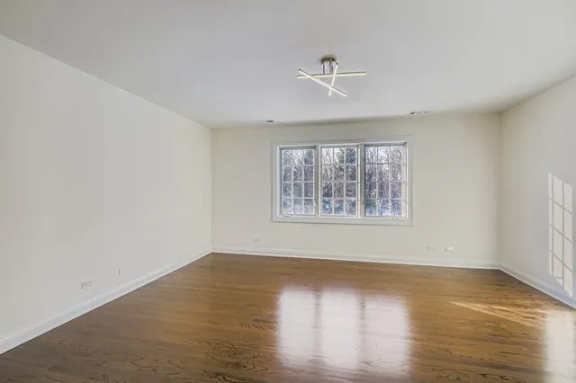 a kitchen that has a sink and a stove