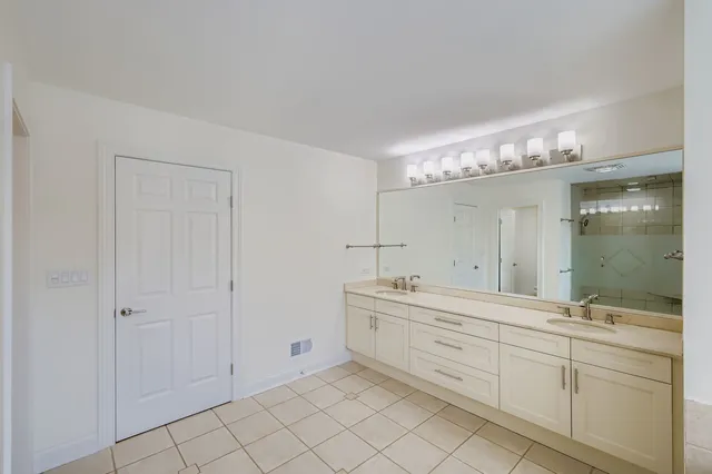 a bathroom with a bathtub and window