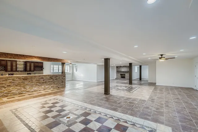 a bathroom with a sink double vanity and a mirror