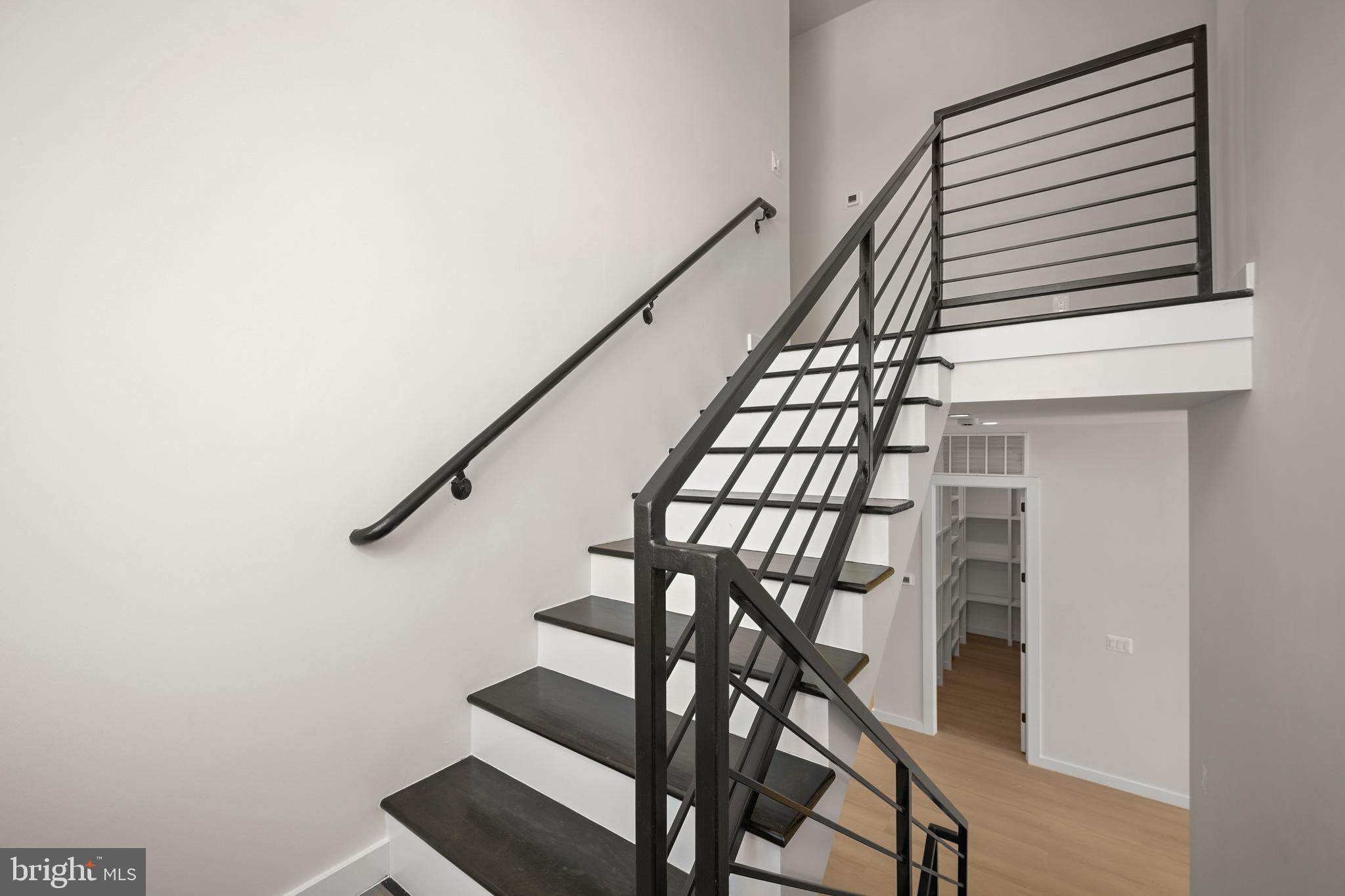 8908 Mohawk Lane Bethesda, MD 20817 - Photo 50 of 106 Stairs to Upper Level