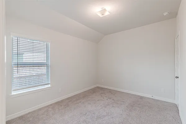 a aerial view of a house with a yard