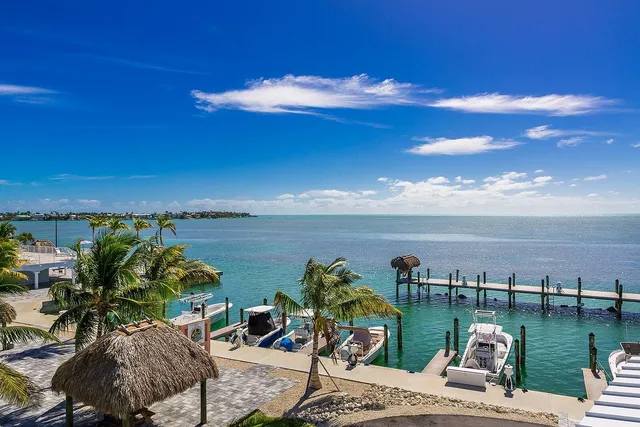 a view of a lake with a yard