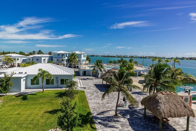 a view of a swimming pool with a patio