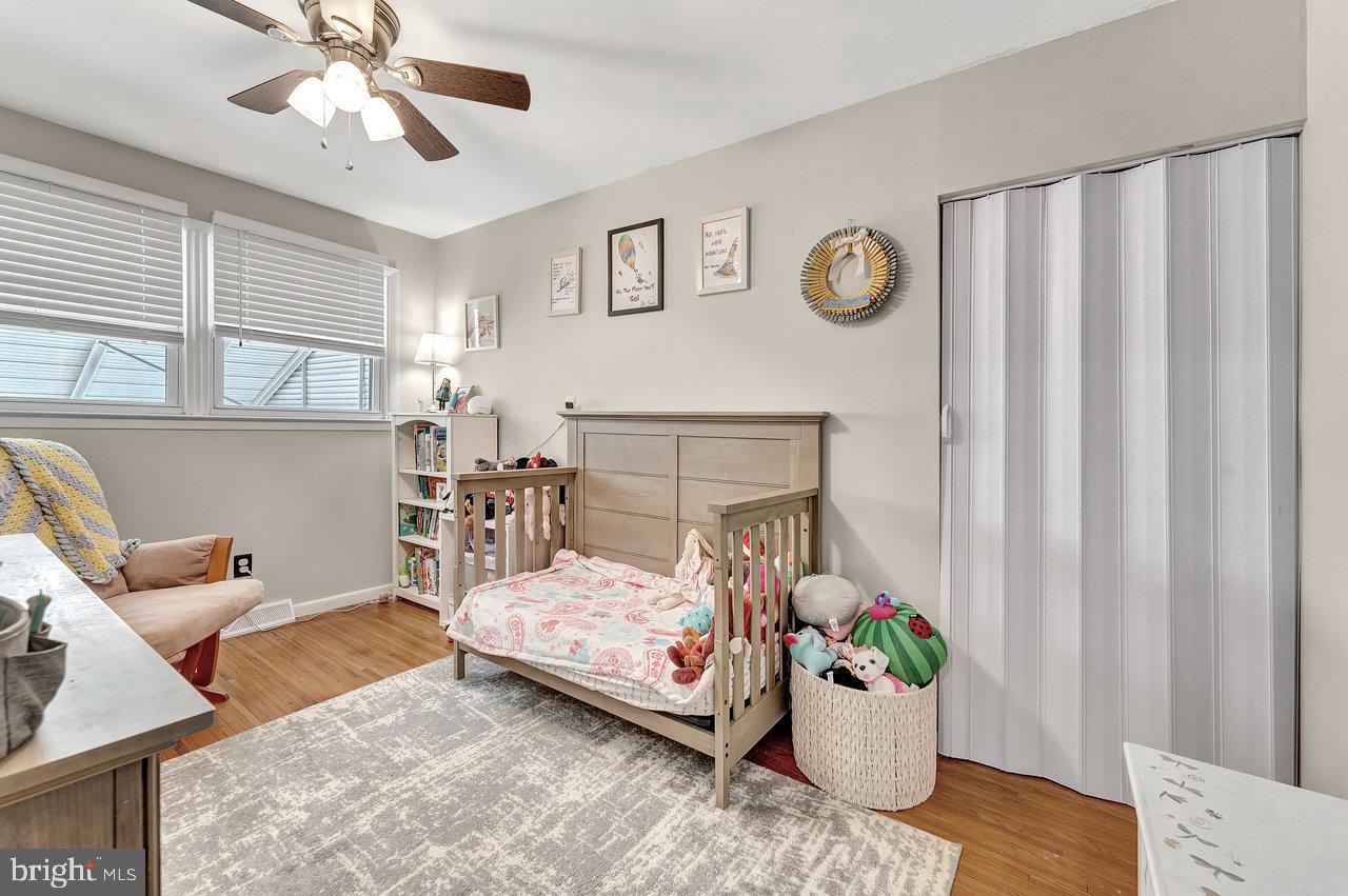 504 Jefferson Street Riverside, NJ 08075 - Photo 17 of 25 a bedroom with a bed and a window