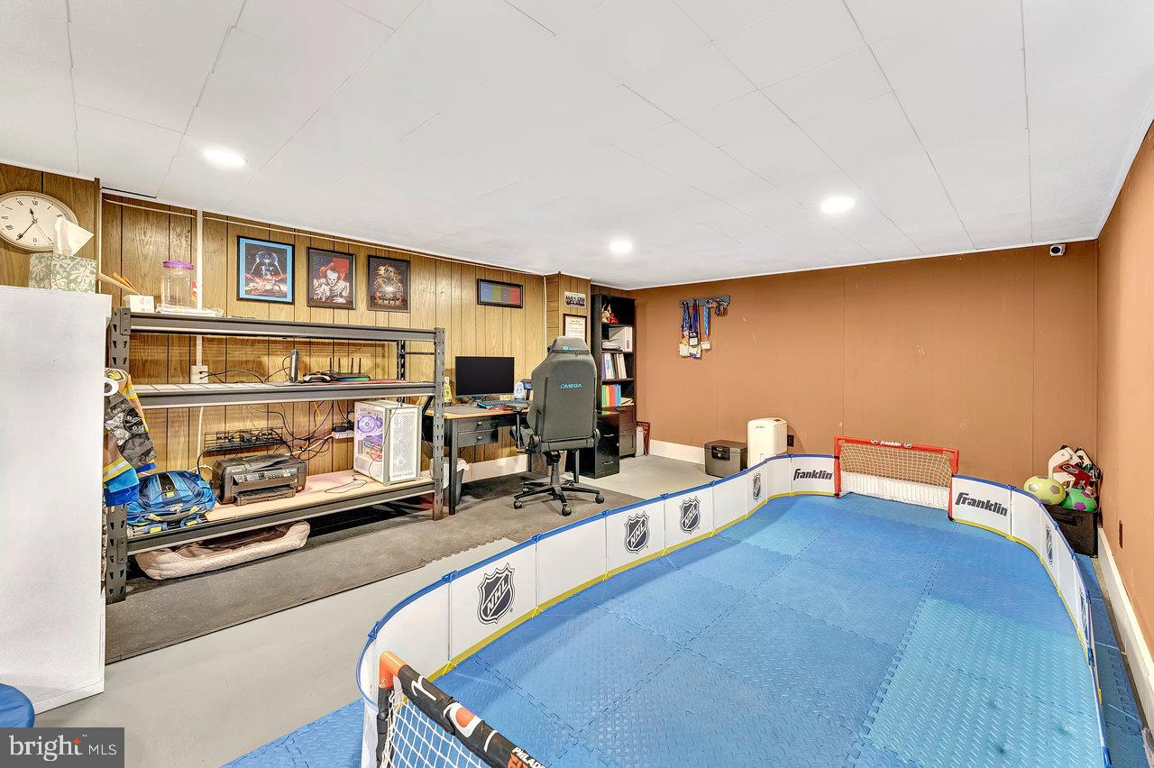 504 Jefferson Street Riverside, NJ 08075 - Photo 21 of 25 a room with gym equipment