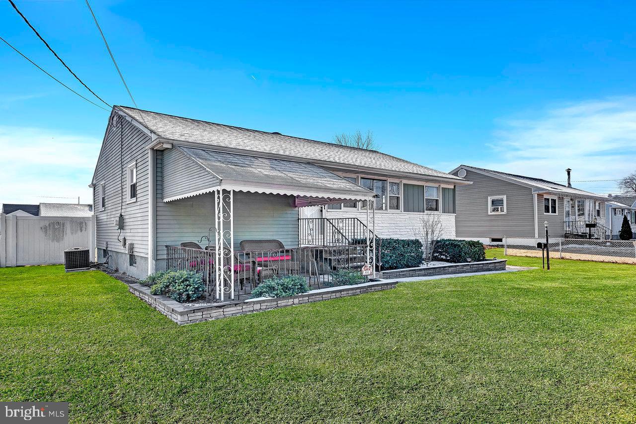 504 Jefferson Street Riverside, NJ 08075 - Photo 3 of 25 a view of a house with a yard and sitting area